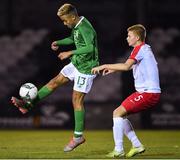 19 November 2019; Caden McLaughlin of Republic of Ireland in action against Bartosz Tomaszewski of Poland during the U15 International Friendly match between Republic of Ireland and Poland at Eamonn Deacy Park in Galway. Photo by Seb Daly/Sportsfile