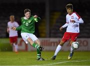 19 November 2019; James McManus of Republic of Ireland in action against Mateusz Wójcik of Poland during the U15 International Friendly match between Republic of Ireland and Poland at Eamonn Deacy Park in Galway. Photo by Seb Daly/Sportsfile