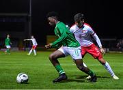 19 November 2019; Gideon Tetteh of Republic of Ireland in action against Konrad Magnuszewki of Poland during the U15 International Friendly match between Republic of Ireland and Poland at Eamonn Deacy Park in Galway. Photo by Seb Daly/Sportsfile