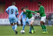 18 November 2019; Ben McCormack of Republic of Ireland, supported by team-mate Omotayo Adaramola, right, gets past Ebrahem Bader, behind, and Bar Nuhi of Israel during the UEFA Under-17 European Championship Qualifier match between Republic of Ireland and Israel at Turner's Cross in Cork. Photo by Piaras Ó Mídheach/Sportsfile