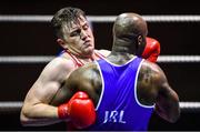 20 November 2019; Thomas Carthy of Crumlin, Co Dublin, left, in action against Kenneth Okungbowa of Athlone, Co Westmeath, in their 91+kg bout during the IABA Irish National Elite Boxing Championships at the National Stadium in Dublin. Photo by Piaras Ó Mídheach/Sportsfile