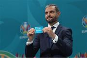 22 November 2019; Former Greek International Angelos Charisteas draws out the card of Semi-Final 2 during the UEFA EURO 2020 Play-Off Draw at UEFA Headquarters in Nyon, Switzerland. Photo by UEFA via Sportsfile