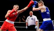 22 November 2019; Referee Sergeant Stephen Kelly looks on as Barry McReynolds of Holy Trinity, Co Antrim, left, takes on Brandon McCarthy of St Michael's Athy, Co Kildare, in their 60kg bout during the IABA Irish National Elite Boxing Championships Finals at the National Stadium in Dublin. Photo by Piaras Ó Mídheach/Sportsfile