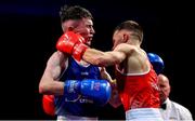22 November 2019; Dean Clancy of Sean McDermott, Co Leitrim, left, in action against Patryk Adamus of Drimnagh, Co Dublin, in their 57kg bout during the IABA Irish National Elite Boxing Championships Finals at the National Stadium in Dublin. Photo by Piaras Ó Mídheach/Sportsfile