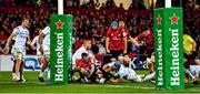 23 November 2019; JJ Hanrahan of Munster loses possession as he is tackled by Simon Zebo of Racing 92 short of the try line during the Heineken Champions Cup Pool 4 Round 2 match between Munster and Racing 92 at Thomond Park in Limerick. Photo by Brendan Moran/Sportsfile