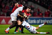 23 November 2019; JJ Hanrahan of Munster is tackled by Cedate Gomes Sa, left, and Teddy Iribaren of Racing 92 during the Heineken Champions Cup Pool 4 Round 2 match between Munster and Racing 92 at Thomond Park in Limerick. Photo by Brendan Moran/Sportsfile