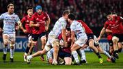 23 November 2019; Rory Scannell of Munster is tackled by Dominic Bird and Henry Chavancy of Racing 92 during the Heineken Champions Cup Pool 4 Round 2 match between Munster and Racing 92 at Thomond Park in Limerick. Photo by Brendan Moran/Sportsfile