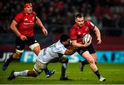23 November 2019; Rory Scannell of Munster is tackled by Boris Palu of Racing 92 during the Heineken Champions Cup Pool 4 Round 2 match between Munster and Racing 92 at Thomond Park in Limerick. Photo by Diarmuid Greene/Sportsfile