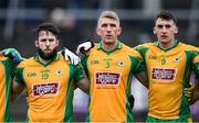 24 November 2019; Corofin players, from left, Conor Cunningham, Kieran Fitzgerald, and Ronan Steede stand for Amhrán na bhFiann before the AIB Connacht GAA Football Senior Club Football Championship Final match between Corofin and Pádraig Pearses at Tuam Stadium in Tuam, Galway. Photo by Piaras Ó Mídheach/Sportsfile