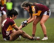 24 November 2019; Rachel Kearns of MacHale Rovers is helped up by team-mate Caoimhe Walsh during the All-Ireland Ladies Junior Club Championship Final match between Donoughmore and MacHale Rovers at Duggan Park in Ballinasloe, Co Galway. Photo by Harry Murphy/Sportsfile