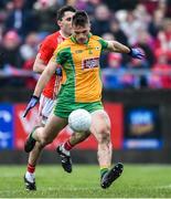 24 November 2019; Liam Silke of Corofin shoots to score his side's first goal as Anthony Butler of Pádraig Pearses closes in during the AIB Connacht GAA Football Senior Club Football Championship Final match between Corofin and Pádraig Pearses at Tuam Stadium in Tuam, Galway. Photo by Piaras Ó Mídheach/Sportsfile