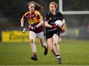 24 November 2019; Rena Buckley of Donoughmore in action against Ellis Keane of MacHale Rovers during the All-Ireland Ladies Junior Club Championship Final match between Donoughmore and MacHale Rovers at Duggan Park in Ballinasloe, Co Galway. Photo by Harry Murphy/Sportsfile