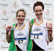 24 November 2019; Fionnuala McCormack, left, with her sister Una Britton of Kilcoole A.C., Co. Wicklow, after winning gold and bronze medals in the Senior Women event during the Irish Life Health National Senior, Junior & Juvenile Even Age Cross Country Championships at the National Sports Campus Abbotstown in Dublin. Photo by Sam Barnes/Sportsfile