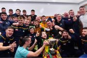 24 November 2019; Corofin supporter Tomás McLoughlin, age 9, celebrates with the players in the dressing room after the AIB Connacht GAA Football Senior Club Football Championship Final match between Corofin and Pádraig Pearses at Tuam Stadium in Tuam, Galway. Photo by Piaras Ó Mídheach/Sportsfile