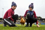 24 November 2019; Eamon, left, and Patrick Grome with Borris-Ileigh team mascot Paddy the cockerel prior to the AIB Munster GAA Hurling Senior Club Championship Final match between Ballygunner and Borris-Ileigh at Páirc Ui Rinn in Cork. Photo by Eóin Noonan/Sportsfile