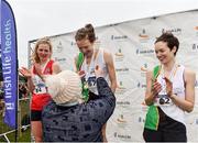 24 November 2019;  Athletics Ireland President Georgina Drumm presents Senior Women's gold medallist Fionnuala McCormack of Kilcoole A.C., Co. Wicklow, with her medal, alongside Mary Mulhare of Portlaoise A.C., Co. Laois, left, who won silver, and Una Britton of Kilcoole A.C., Co. Wicklow, who won bronze, with during the Irish Life Health National Senior, Junior & Juvenile Even Age Cross Country Championships at the National Sports Campus Abbotstown in Dublin. Photo by Sam Barnes/Sportsfile