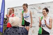 24 November 2019;  Athletics Ireland President Georgina Drumm presents Senior Women's gold medallist Fionnuala McCormack of Kilcoole A.C., Co. Wicklow, with her medal, alongside Mary Mulhare of Portlaoise A.C., Co. Laois, left, who won silver, and Una Britton of Kilcoole A.C., Co. Wicklow, who won bronze, with during the Irish Life Health National Senior, Junior & Juvenile Even Age Cross Country Championships at the National Sports Campus Abbotstown in Dublin. Photo by Sam Barnes/Sportsfile