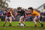 24 November 2019; Amy Walsh of Donoughmore in action against Grace Murray, left, and Niamh Larkin of MacHale Rovers during the All-Ireland Ladies Junior Club Championship Final match between Donoughmore and MacHale Rovers at Duggan Park in Ballinasloe, Co Galway. Photo by Harry Murphy/Sportsfile
