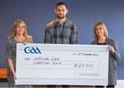 29 November 2019; GAA representative Kevin Sexton presents a cheque to Ciara Carty and Elaine Fleming of Focus Ireland during the GAA Charities Cheque Handover at Canal Café in Croke Park, Dublin. Photo by Harry Murphy/Sportsfile