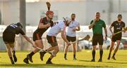 29 November 2019; Antrim's Neil McManus of 2019 PwC All-Star in action against Clare's John Conlon of 2018 PwC All-Star and Donegal's Declan Coulter of 2018 PwC All-Star  during the PwC All Star Hurling Tour 2019 All Star game at Zayed Sport City in Abu Dhabi, United Arab Emirates. Photo by Ray McManus/Sportsfile