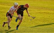 29 November 2019; Carlow's Edward Byrne of 2018 PwC All-Star in action against Cork's Patrick Horgan of 2019 PwC All-Star during the PwC All Star Hurling Tour 2019 All Star game at Zayed Sport City in Abu Dhabi, United Arab Emirates. Photo by Ray McManus/Sportsfile