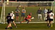 29 November 2019; Cork's Anthony Nash of 2019 PwC All-Star dives to his left to save a shot from Limerick's Graeme Mulcahy, 13, of 2018 PwC All-Star during the PwC All Star Hurling Tour 2019 All Star game at Zayed Sport City in Abu Dhabi, United Arab Emirates. Photo by Ray McManus/Sportsfile