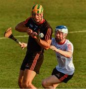 29 November 2019; Limerick's Dan Morrissey of 2018 PwC All-Star in action against Sligo's James Weir of 2019 PwC All-Star during the PwC All Star Hurling Tour 2019 All Star game at Zayed Sport City in Abu Dhabi, United Arab Emirates. Photo by Ray McManus/Sportsfile