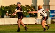 29 November 2019; Donegal's Declan Coulter of 2018 PwC All-Star in action against Laois' Enda Rowland of 2019 PwC All-Star   during the PwC All Star Hurling Tour 2019 All Star game at Zayed Sport City in Abu Dhabi, United Arab Emirates. Photo by Ray McManus/Sportsfile