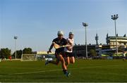 29 November 2019; Greg Murphy, formerly of Cork and now with Abu Dhabi Na Fianna and a sub on the 2018 PwC All-Star team, is tackled by Cork's Patrick Horgan of 2019 PwC All-Star   during the PwC All Star Hurling Tour 2019 All Star game at Zayed Sport City in Abu Dhabi, United Arab Emirates. Photo by Ray McManus/Sportsfile