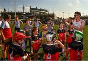 29 November 2019; Donegal's Declan Coulter of 2018 PwC All-Star team with local children during a coaching session before the PwC All Star Hurling Tour 2019 All Star game at Zayed Sport City in Abu Dhabi, United Arab Emirates. Photo by Ray McManus/Sportsfile