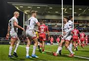 29 November 2019; Ulster's Matt Faddes, left, celebrates with team-mates after scoring his side's first try during the Guinness PRO14 Round 7 match between Ulster and Scarlets at the Kingspan Stadium in Belfast. Photo by Ramsey Cardy/Sportsfile