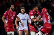 29 November 2019; Louis Ludik of Ulster is tackled by Sam Lousi, left, and Uzair Cassiem of Scarlets during the Guinness PRO14 Round 7 match between Ulster and Scarlets at the Kingspan Stadium in Belfast. Photo by Ramsey Cardy/Sportsfile