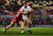 29 November 2019; Sean Reidy of Ulster is tackled by Corey Baldwin of Scarlets during the Guinness PRO14 Round 7 match between Ulster and Scarlets at the Kingspan Stadium in Belfast. Photo by Ramsey Cardy/Sportsfile