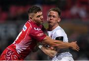 29 November 2019; Craig Gilroy of Ulster is tackled by Corey Baldwin of Scarlets during the Guinness PRO14 Round 7 match between Ulster and Scarlets at the Kingspan Stadium in Belfast. Photo by Ramsey Cardy/Sportsfile