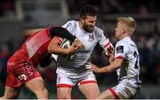 29 November 2019; Stuart McCloskey of Ulster is tackled by Steff Evans of Scarlets during the Guinness PRO14 Round 7 match between Ulster and Scarlets at the Kingspan Stadium in Belfast. Photo by Ramsey Cardy/Sportsfile