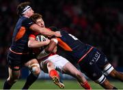 29 November 2019; Ben Healy of Munster is tackled by Hamish Watson and Villame Mata of  Edinburgh during the Guinness PRO14 Round 7 match between Munster and Edinburgh at Irish Independent Park in Cork. Photo by Matt Browne/Sportsfile