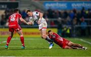 29 November 2019; Craig Gilroy is tackled by Paul Asquith during the Guinness PRO14 Round 7 match between Ulster and Scarlets at Kingspan Stadium in Belfast. Photo by John Dickson/Sportsfile