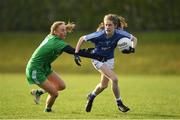 30 November 2019; Emma Murray of Munster in action against Aoibhin Cleary of Leinster during the Ladies Football Interprovincial Round 1 match between Leinster and Munster at Kinnegad in Co Westmeath. Photo by Matt Browne/Sportsfile