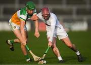 30 November 2019; Cathal Derivan of Kildare in action against Brian Duignan of Offaly during the Kehoe Cup Round 1 match between Offaly and Kildare at St Brendan's Park in Birr, Co Offaly. Photo by Piaras Ó Mídheach/Sportsfile