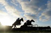 30 November 2019; Presented Well, with Rachael Blackmore up, left, and Jukebox Jive, with Jonathan Moore up, right, jump the last during the Fairyhouse 2020 Membership Handicap Hurdle on Day One of the Fairyhouse Winter Festival at Fairyhouse Racecourse in Ratoath, Meath. Photo by Harry Murphy/Sportsfile
