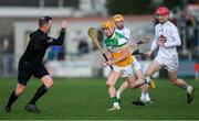 30 November 2019; Liam Langton of Offaly gets past James Burke of Kildare as referee David Hughes gets out of the way during the Kehoe Cup Round 1 match between Offaly and Kildare at St Brendan's Park in Birr, Co Offaly. Photo by Piaras Ó Mídheach/Sportsfile