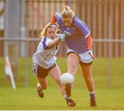 30 November 2019; Saoirse Noonan of Munster in action against Shauna Molloy of Connacht during the Ladies Football Interprovincial Final match between Munster and Connact at Kinnegad in Co Westmeath. Photo by Matt Browne/Sportsfile