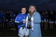 30 November 2019; Marie Hickey, LGFA President, presents the Mick Talbot cup to Melissa Duggan captain of Munster after the Ladies Football Interprovincial Final match between Munster and Connact at Kinnegad in Co Westmeath. Photo by Matt Browne/Sportsfile