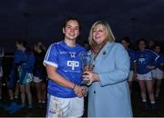 30 November 2019; Marie Hickey, LGFA President, presents the player of the match trophy to Niamh O'De of Munster after the Ladies Football Interprovincial Final match between Munster and Connact at Kinnegad in Co Westmeath. Photo by Matt Browne/Sportsfile