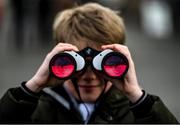 1 December 2019; Louie McMahon, aged nine, from Scotshouse, Co. Monaghan looks through his binoculars on Day 2 of the Fairyhouse Winter Festival at Fairyhouse Racecourse in Meath. Photo by Harry Murphy/Sportsfile
