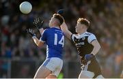1 December 2019; Charles McGuinness of Naomh Conaill in action against Ryan McEvoy of Kilcoo during the AIB Ulster GAA Football Senior Club Championship Final match between Kilcoo and Naomh Conaill at Healy Park in Omagh, Tyrone. Photo by Oliver McVeigh/Sportsfile