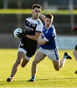 11 December 2019; Ryan Johnston of Kilcoo in action against Eunan Doherty of Naomh Conaill during the AIB Ulster GAA Football Senior Club Championship Final match between Kilcoo and Naomh Conaill at Healy Park in Omagh, Tyrone. Photo by Oliver McVeigh/Sportsfile