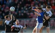 1 December 2019; Ryan McEvoy of Kilcoo in action against Charles McGuinness of Naomh Conaill during the AIB Ulster GAA Football Senior Club Championship Final match between Kilcoo and Naomh Conaill at Healy Park in Omagh, Tyrone. Photo by Oliver McVeigh/Sportsfile
