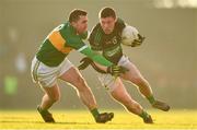 1 December 2019; Mark Cronin of Nemo Rangers is tackled by Danny Madigan of Clonmel Commercials during the AIB Munster GAA Football Senior Club Championship Final match between Nemo Rangers and Clonmel Commercials at Fraher Field in Dungarvan, Waterford. Photo by Eóin Noonan/Sportsfile