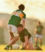 1 December 2019; Mark Cronin of Nemo Rangers is tackled by Ross Peters of Clonmel Commercials during the AIB Munster GAA Football Senior Club Championship Final match between Nemo Rangers and Clonmel Commercials at Fraher Field in Dungarvan, Waterford. Photo by Eóin Noonan/Sportsfile